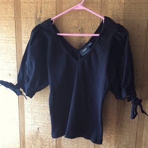 Maeve black V-neck puff sleeved tie shirt